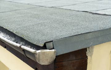 repair or replace Wildwood flat roofing?